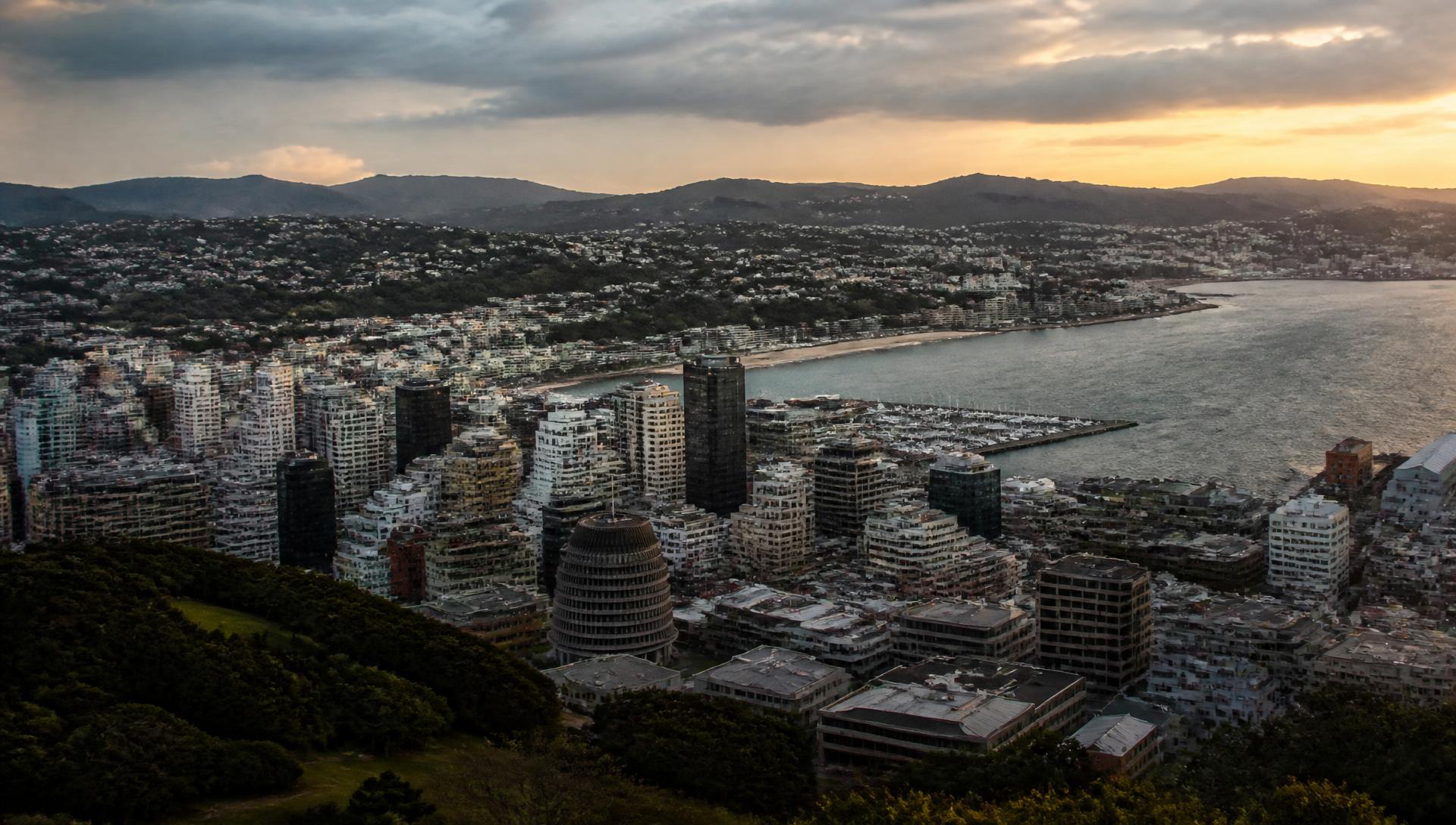 Wellington CBD at dusk with harbour and Beehive